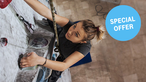 Woman on climbing wall